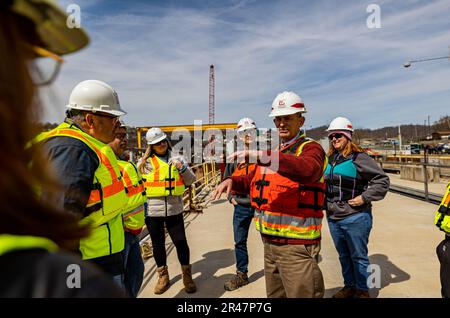 Mark Jones, the chief of Engineering and Construction for the U.S. Army Corps of Engineers Pittsburgh District, talks to members of the Society of American Military Engineers visiting the construction site at the Monongahela River Locks and Dam 4 in Charleroi, Pennsylvania, March 21, 2023.  The U.S. Army Corps of Engineers Pittsburgh District operates the facility and has overseen the construction project at Charleroi to improve inland navigation in the region.  Many of the visitors on the tour represent firms who provided contracts for the project.  The newly constructed chamber is scheduled Stock Photo
