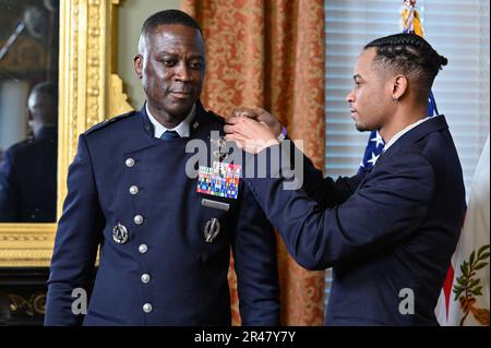 Space Force Brig. Gen. Jacob Middleton has his new rank pinned on during his promotion at the Eisenhower Executive Office Building, Washington, D.C., April 4, 2023. Middleton is the director of national security space policy for the National Space Council. Stock Photo