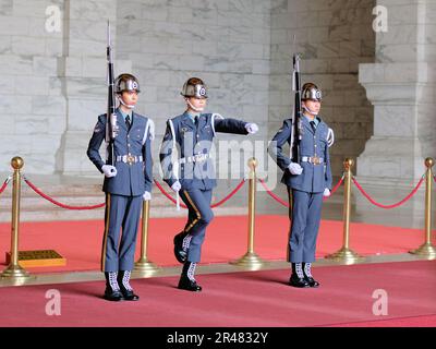 Changing of the guard ceremony at the bronze statue of Chiang Kai-Shek in the main chamber at the Chiang Kai-shek Memorial Hall; Taipei, Taiwan. Stock Photo