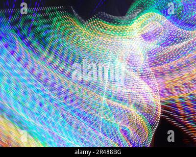 A blurred image with a blue patterned background, creating an abstract and dreamy aesthetic Stock Photo