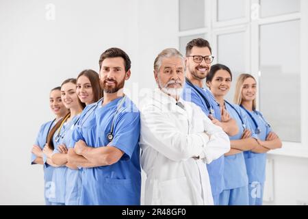 Doctor and his colleagues in hospital. Medical service Stock Photo