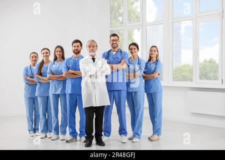 Doctor and his colleagues in hospital. Medical service Stock Photo