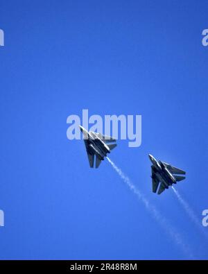 US Navy A pair of F-14 Tomcats conduct an aerial flyover of the Nimitz ...