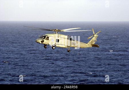 US Navy SH-60 Seahawk provides plane guard support Stock Photo