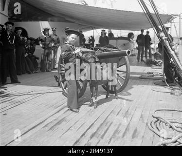 U.S.S. New York, Admiral Sampson's son and Pitch the mascot, between 1893 and 1901. Stock Photo