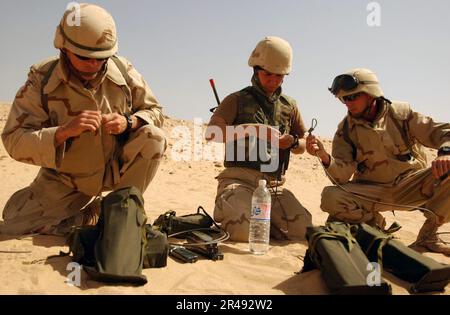 US Navy Members of Underwater Construction Team Two (UCT-2) prepare for an explosives training exercise at a remote area in Kuwait Stock Photo