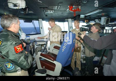 US Navy Rear Admiral John D. Stufflebeem, Commander Task Force 60, addresses the crew of USS Harry S. Truman (CVN 75) Stock Photo