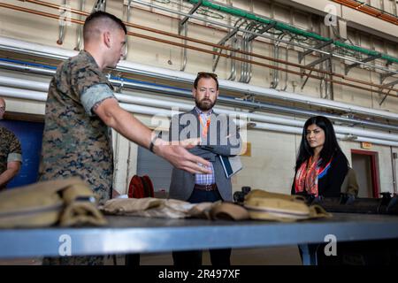 Mr. Patrick Nevins, left, and Ms. Sapna Sharma, right, both staff members of the House Armed Services Committee, discus unit safety and readiness with leaders from 2nd Assault Amphibious Battalion, 2nd Marine Division, during a house armed services committee staff member visit aboard Marine Corps Base Camp Lejeune, North Carolina, March 31, 2023. Mr. Patrick Nevins and Ms. Sapna Sharma, professional staff members of the House Armed Services Committee, visited II MEF and major subordinate commands to discuss amphibious readiness and shipping, force posture and other topics related to the Comman Stock Photo