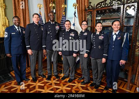 Space Force Brig. Gen. Jacob Middleton, third from left, poses with Vice Chief of Space Operations Gen. David Thompson, second from left, Chief of Space Operations Gen. Chance Saltzman, center, and staff during his promotion at the Eisenhower Executive Office Building, Washington, D.C., April 4, 2023. Middleton is the director of national security space policy for the National Space Council. Stock Photo