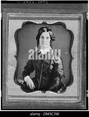 Joannette Clark Benjamin, three-quarter length portrait of a woman, facing front, seated, between 1840 and 1860. Additional Details: Possibly maternal grandmother of photographer Frances Benjamin Johnston. Stock Photo