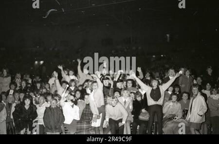 SAN DIEGO, USA, 1965: The crowd reacts at a concert with the Dave Clark Five, organised by radio station KCBQ Stock Photo
