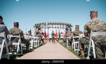 U.S. Marine Corps Sgt. Maj. Oranjel Leavy, the outgoing sergeant major of the 15th Marine Expeditionary Unit, delivers remarks during the 15th MEU relief and appointment ceremony at Marine Corps Base Camp Pendleton, California, April 6, 2023. During the ceremony, Sgt. Maj. Oranjel Leavy relinquished his post to Sgt. Maj. John Schlaud, after serving as the 15th MEU sergeant major since June 2021. Stock Photo