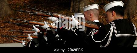 US Navy Sailors assigned to U.S. Navy Ceremonial Guard fire their rifles during a performance in Annapolis, Md Stock Photo