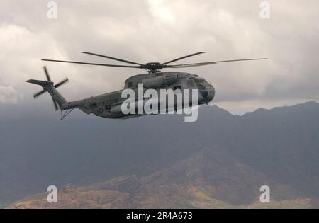 US Navy A U.S. Marine Corps CH-53D Sea Stallion helicopter, assigned to the Ugly Angels of Marine Heavy Helicopter Squadron, Three Six Two (HMH-362), conducts island familiarization flights in support of RIMP Stock Photo