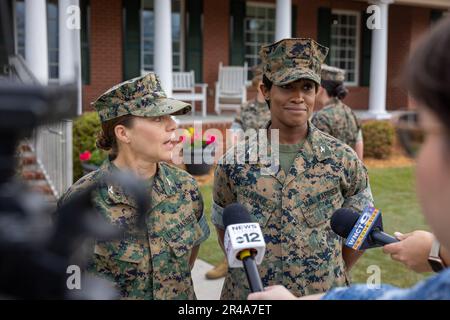 U.S. Marine Corps Col. Lauren Edwards, commanding officer of Combat Logistic Regiment 27, 2nd Marine Logistics Group, left, and Col. Marshalee Clarke, commanding officer of Marine Corps Combat Service Support Schools, right, take part in an interview during a Woman Marine Commanders Assembly, aboard Marine Corps Base Camp Lejeune, North Carolina, April 5, 2023. The 14 women commanders organized the informal meeting to discuss a variety of topics, ranging from personal experiences, MAGTF operations, readiness, and challenges facing their respective units. Stock Photo