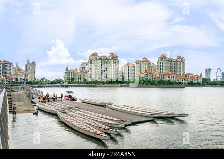 Dragon Boats park besides Water Sports Centre at Singapore Sports Hub. It is a sports and recreation district in Kallang, Singapore. Stock Photo