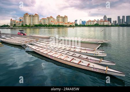 Dragon Boats park besides Water Sports Centre at Singapore Sports Hub. It is a sports and recreation district in Kallang, Singapore. Stock Photo