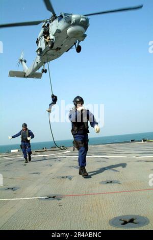 The Australian guided missile frigate HMAS ADELAIDE (FFG-01) and the ...