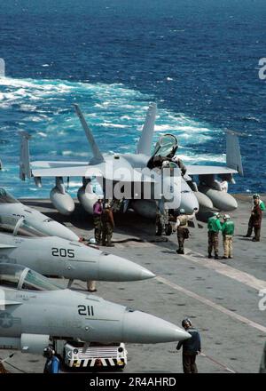 US Navy F-A-18E Super Hornets are prepared for flight operations on the flight deck aboard USS Abraham Lincoln (CVN 72) Stock Photo