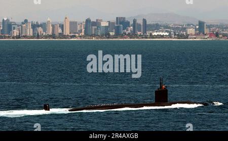 US Navy  The Los Angeles-class fast attack submarine USS Jefferson City (SSN 759) underway near San Diego Harbor after conducting routine operations in the Pacific Ocean. Stock Photo