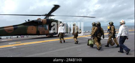 An Australian Army S70A-9 Black Hawk helicopter prepares to land on the ...
