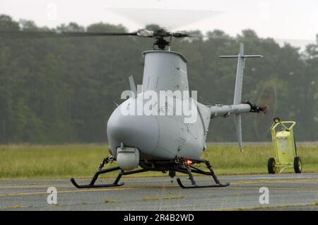 US Navy  A RQ-8A Fire Scout Vertical Takeoff and Landing Tactical Unmanned Aerial Vehicle (VTUAV) System turns at its flight power setting prior to a flight demonstration. Stock Photo