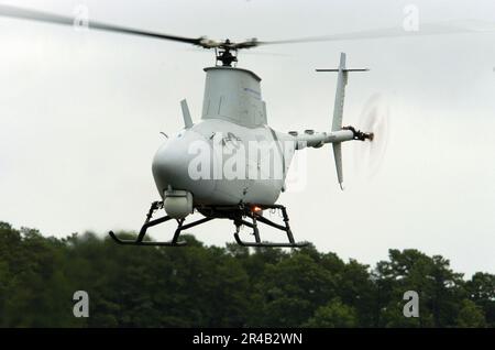 US Navy  A RQ-8A Fire Scout Vertical Takeoff and Landing Tactical Unmanned Aerial Vehicle (VTUAV) System takes off for a flight demonstration at the 2005 Naval Unmanned Aerial Vehicle Air Demo. Stock Photo