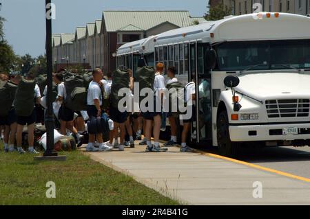 US Navy  Students assigned to Naval Aviation Technical Training Center (NATTC) load onto buses as they prepare to evacuate. Stock Photo