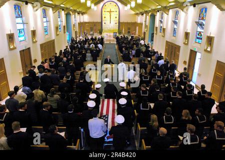 US Navy  Senior Chief Petty Officer (SEAL), is carried into a funeral service at St. Charles Borromeo Catholic Church, San Diego. Stock Photo