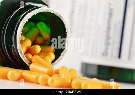 Composition with dietary supplement capsules. Drug pills Stock Photo