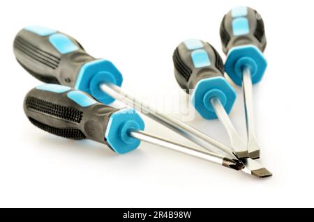Composition with four screwdrivers isolated on white background Stock Photo