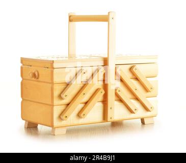 Wooden box for needles and threads isolated on white background Stock Photo