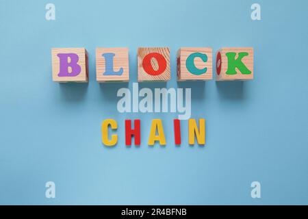 Cryptocurrency for kids. Block chain with Blockchain word from colorful letters on blue background Stock Photo