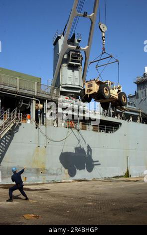 US Navy A crane aboard the dock landing ship USS Pearl Harbor (LSD 52 ...