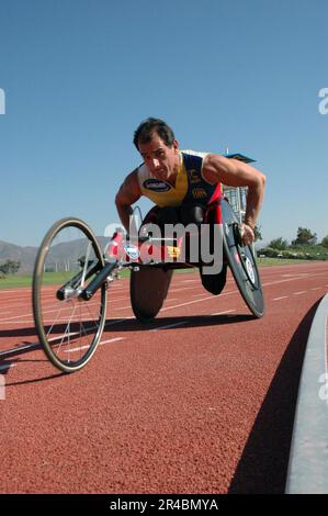 US Navy  U.S. Navy Engineman 2nd Class participates in a track clinic at the U.S. Olympic Training Center in Chula Vista, Calif. Stock Photo