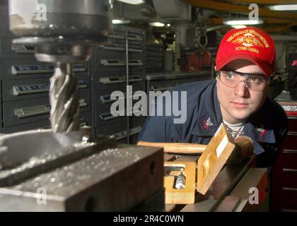 US Navy Machinery Repairman 2nd Class turns a Hossfeld pipe bender ...