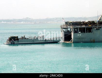 Landing Craft Utility 1651 performs a stern gate mating with USS ...