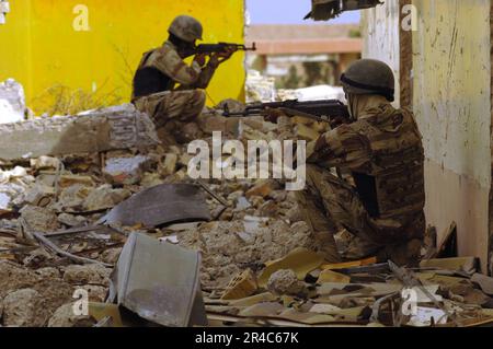 US Navy  Two Iraqi Army soldiers post security during a building clearing exercise. Stock Photo