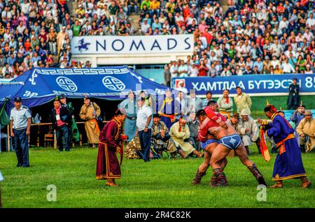 Mongolian wrestlers, Naadam Festival, National Stadium, Ulaanbaatar, Mongolia. © Kraig Lieb Stock Photo