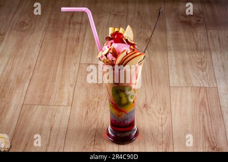 Mixed Fruit Ice cream or Falooda on wooden background Stock Photo