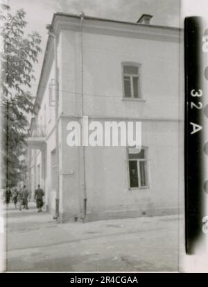 SS Photographer Ahrens captures the intensity and brutality of the Kavallerie operations in Russia during  May and June 1943, providing a haunting glimpse into the grim realities of war through his lens. Senior officers in dress uniforms with awards, wounded soldiers in war hospital; soldiers with Russian civilians; awards ceremonies, landscapes, saw mill, terrain table exercise, fighting positions, soldiers relaxing and swimming, infantry squad field training, propaganda material being handed out to Russian civilians, burning village, assault gun unit, field barracks scenes. Images depicting Stock Photo