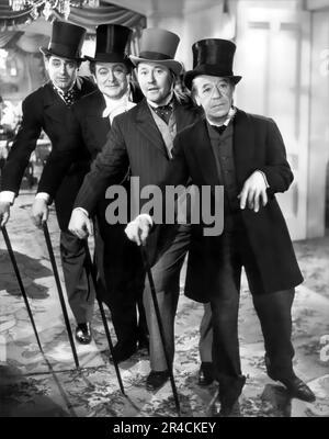 CARY GRANT, DONALD MEEK, JACK OAKIE and EDWARD ARNOLD in THE TOAST OF NEW YORK (1937), directed by ROWLAND V. LEE. Credit: RKO / Album Stock Photo