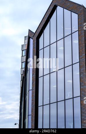 Stavanger, Rogaland, Norway, May 19 2023, Modern Glass Facade High Rise Commercial Building Architecture Downtown Stavanger With No People Stock Photo
