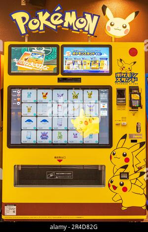 Pokemon toy vending machine at haneda airport, Japan. Yellow machine with  options to pay by cash or credit card, selling Pokemon toys and figures  Stock Photo - Alamy