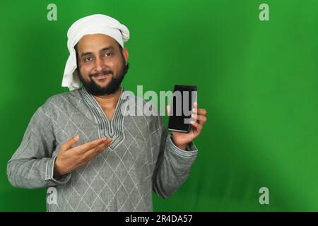 Young Indian Farmer Showing His Mobile on Right Hand With One Finger In ...