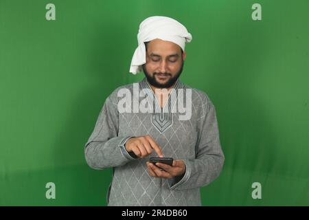 Indian Young Farmer Doing Something With Right Hand In His Mobile In ...