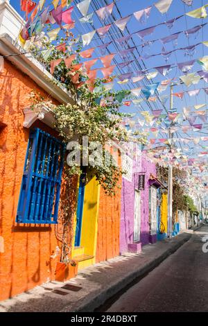 Colorful Bunting Flags Strung Across A Street In Falmouth Cornwall With 