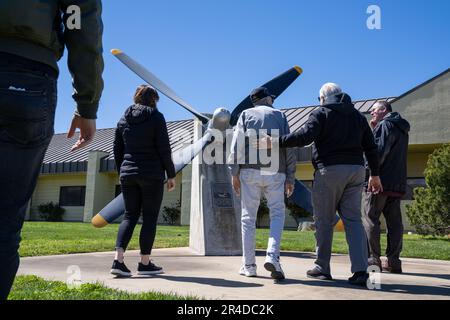 Retired Master Sgt. Eugene T. Beal and his family approach a B-29 Superfortress propeller display April 3, 2023, at Beale Air Force Base, California. Eugene began his Air Force career in 1952 as a B-29 tail gunner during the Korean War. Stock Photo