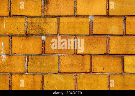 Yellow clinker brick wall texture as background Stock Photo