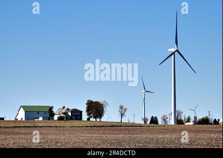 Malta, Illinois, USA. Wind turbines on farms in an agricultural section of northern Illinois. Stock Photo